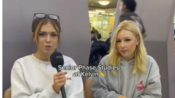 Two senior phase students at Glasgow Kelvin College sit in a relaxed setting, one holding a microphone as they talk about their experience. Text on screen reads “Senior Phase Studies at Kelvin” and “Kelvin College we're in our senior phase Two senior phase students at Glasgow Kelvin College sit in a relaxed setting, one holding a microphone as they talk about their experience. Text on screen reads “Senior Phase Studies at Kelvin” and “Kelvin College we're in our senior phase